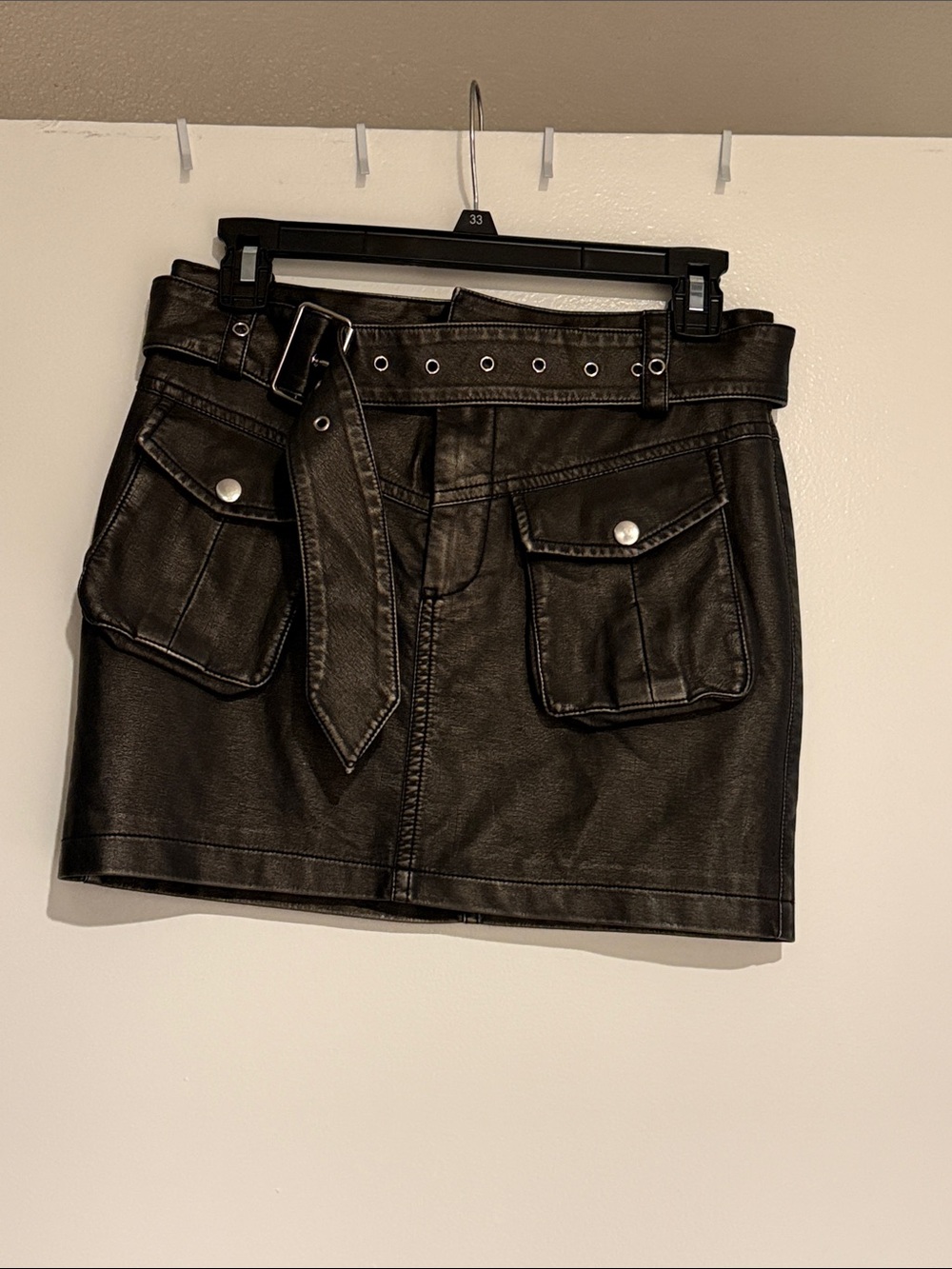 AKIRA Black Faux Leather Mini Skirt with Belted Waist and Cargo Pockets